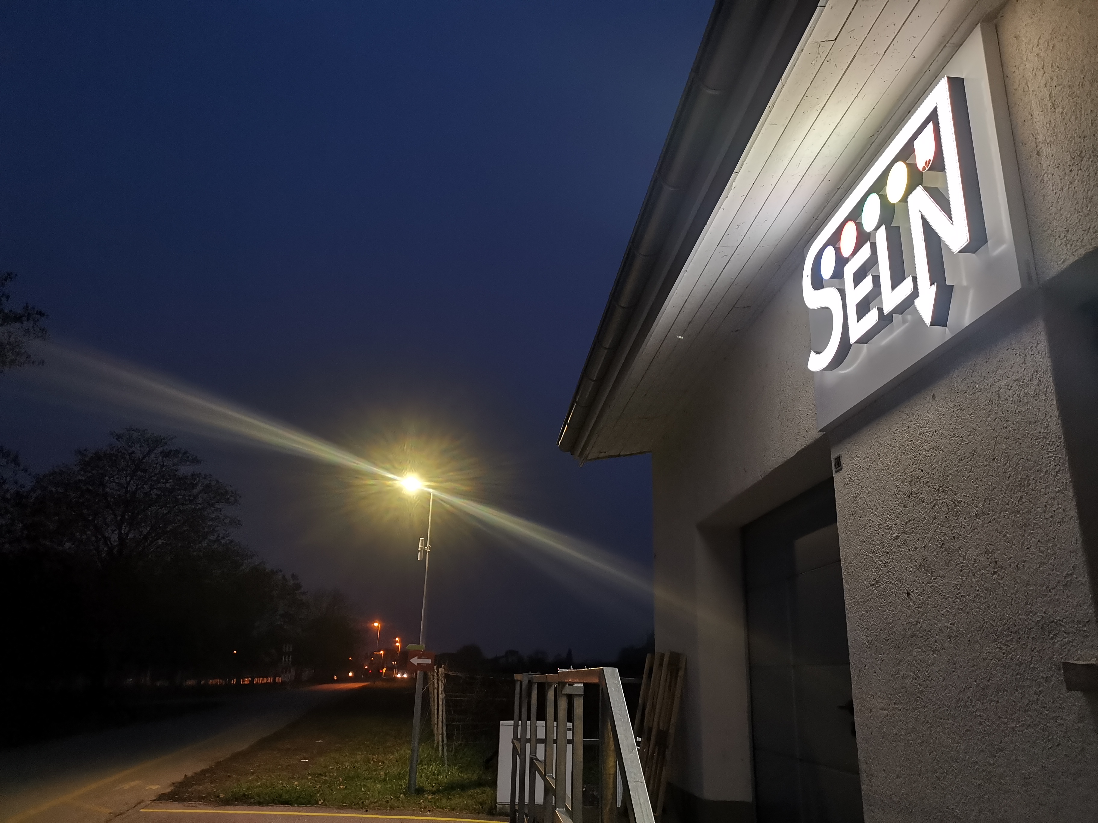 Facade Signage with Inverted Light Effect