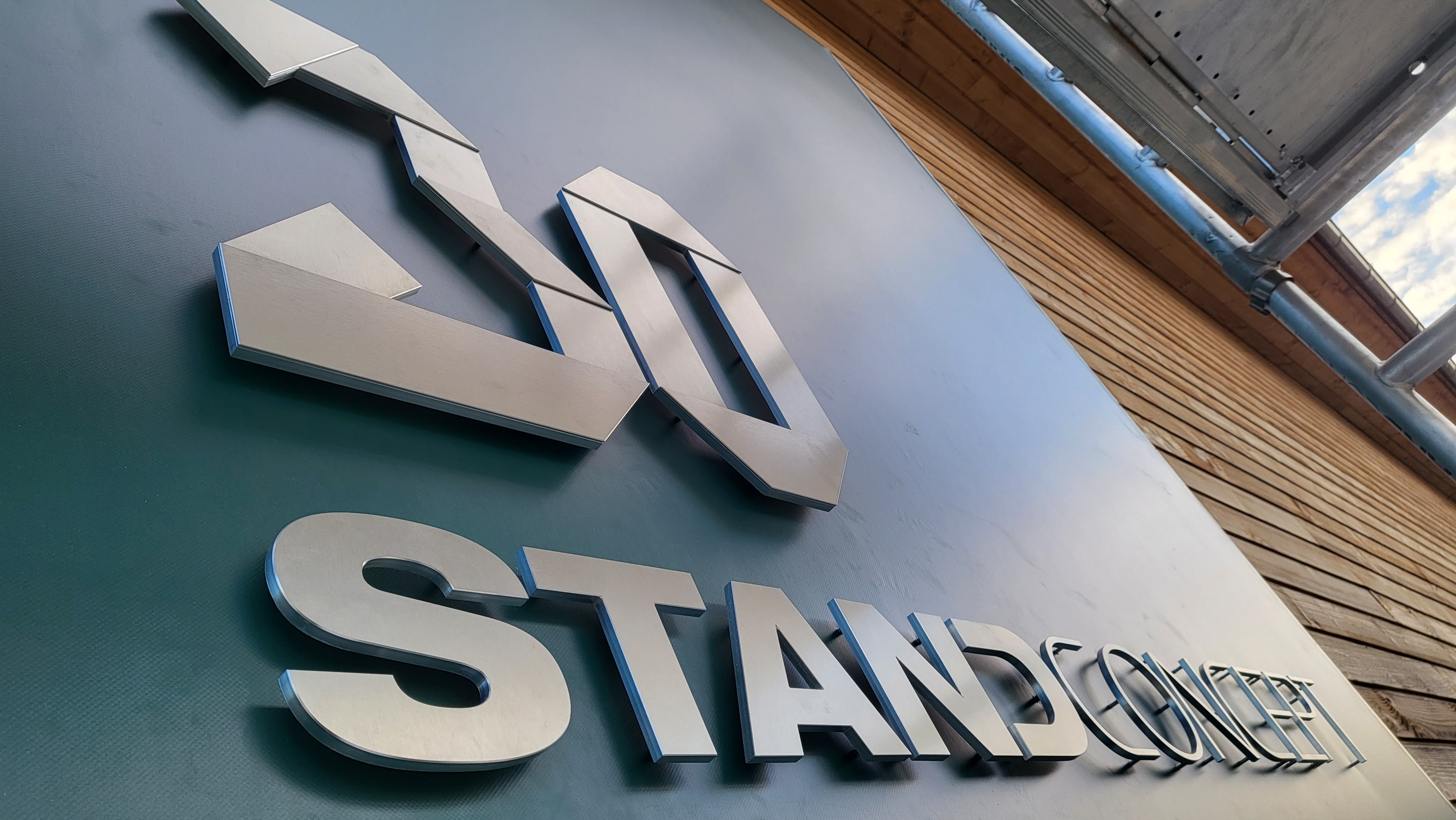 Aluminum Signage on Taut Facade Banner